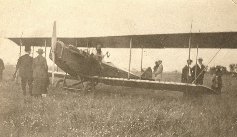 Plane in field about 1921