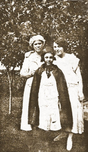 Theresa in a cape with Aunt Lou Shoemaker and sister Anna. Probably taken in Benton Harbor, Michigan. This is a copy of the original which is in the collection of one of the Shoemaker descendents.