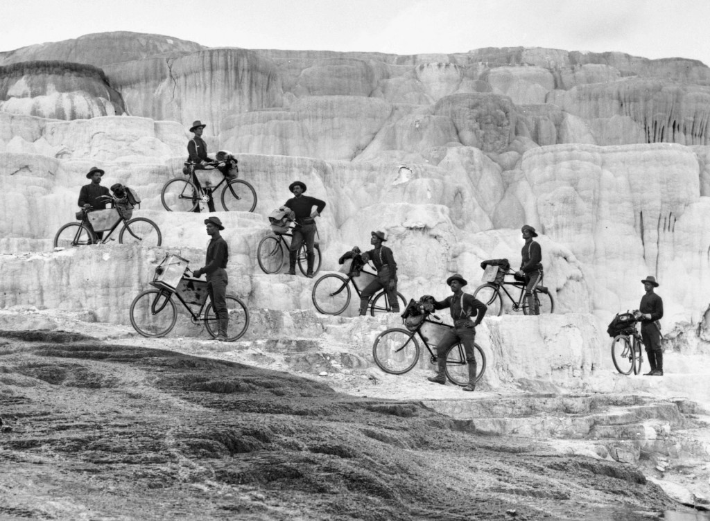 "Bicyclists' group on Minerva Terrace.  [Lt. James A. Moss's company of 25th Infantry, U. S. Army Bicycle Corps, from Fort Missoula, Montana.]  YNP."  October 7, 1896.